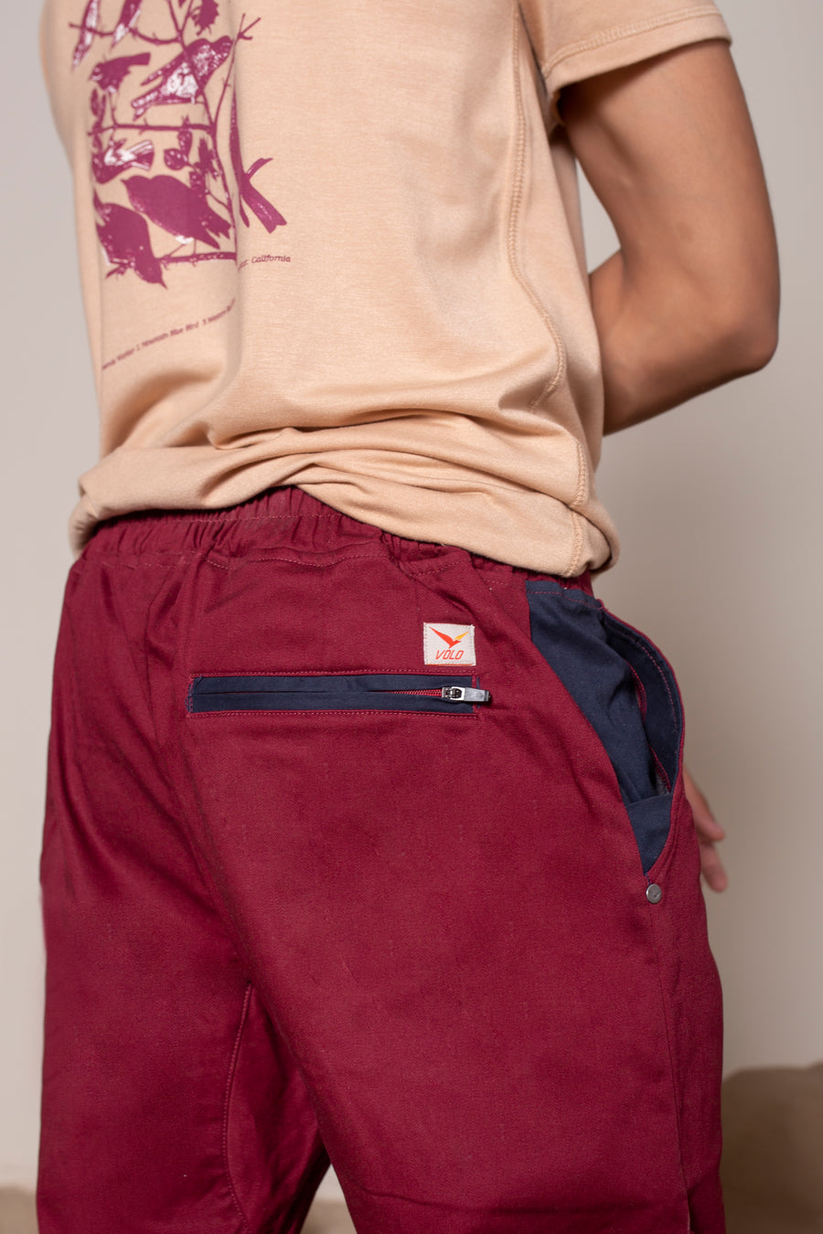 Men's Earth Joggers Jasper Red | VOLO Apparel | Designed for you to rock climb, hike, yoga, run or just chill. The most versatile athletic joggers that are fitted for your every daily life and all your athletic endeavors. The Earth Joggers comes with five pockets, features a 3 point gusset, 2 zipper pockets, snap buttons, tapered bottoms, and a breathable stretchy spandex cotton twill. With an internal drawstring and a tailored fit, these are gonna be your go to adventure joggers.