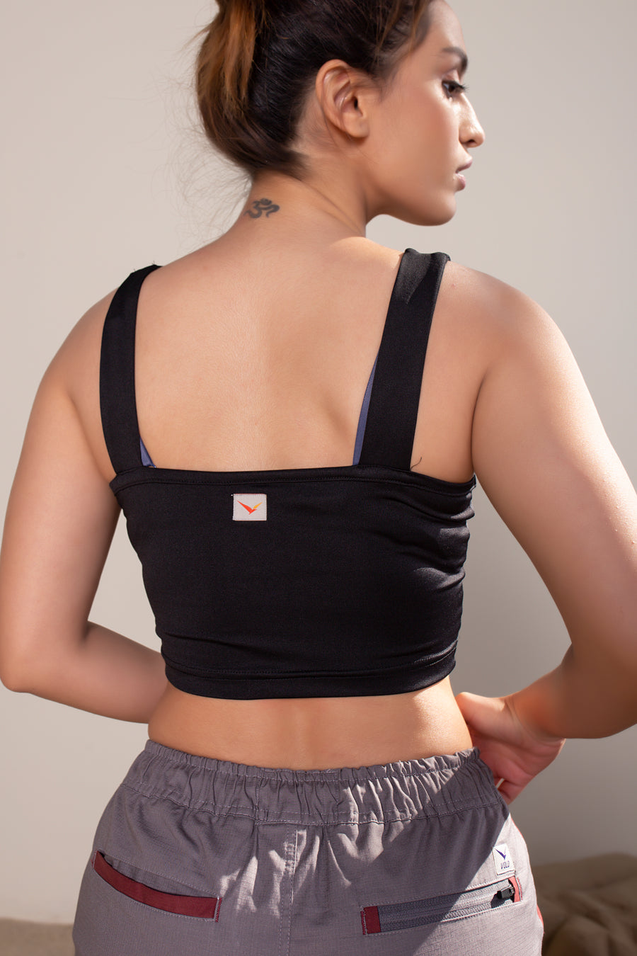 Women's Vera Crop in Black | VOLO Apparel | The perfect athletic crop top made with a four way stretch bamboo fiber blend. Double lined and naturally odor resistant and antimicrobial. The Vera bamboo crop is reinforced stitched, the bamboo fiber comes with its own climate control properties, making the tops more breathable in the heat and more insulating in the cold.