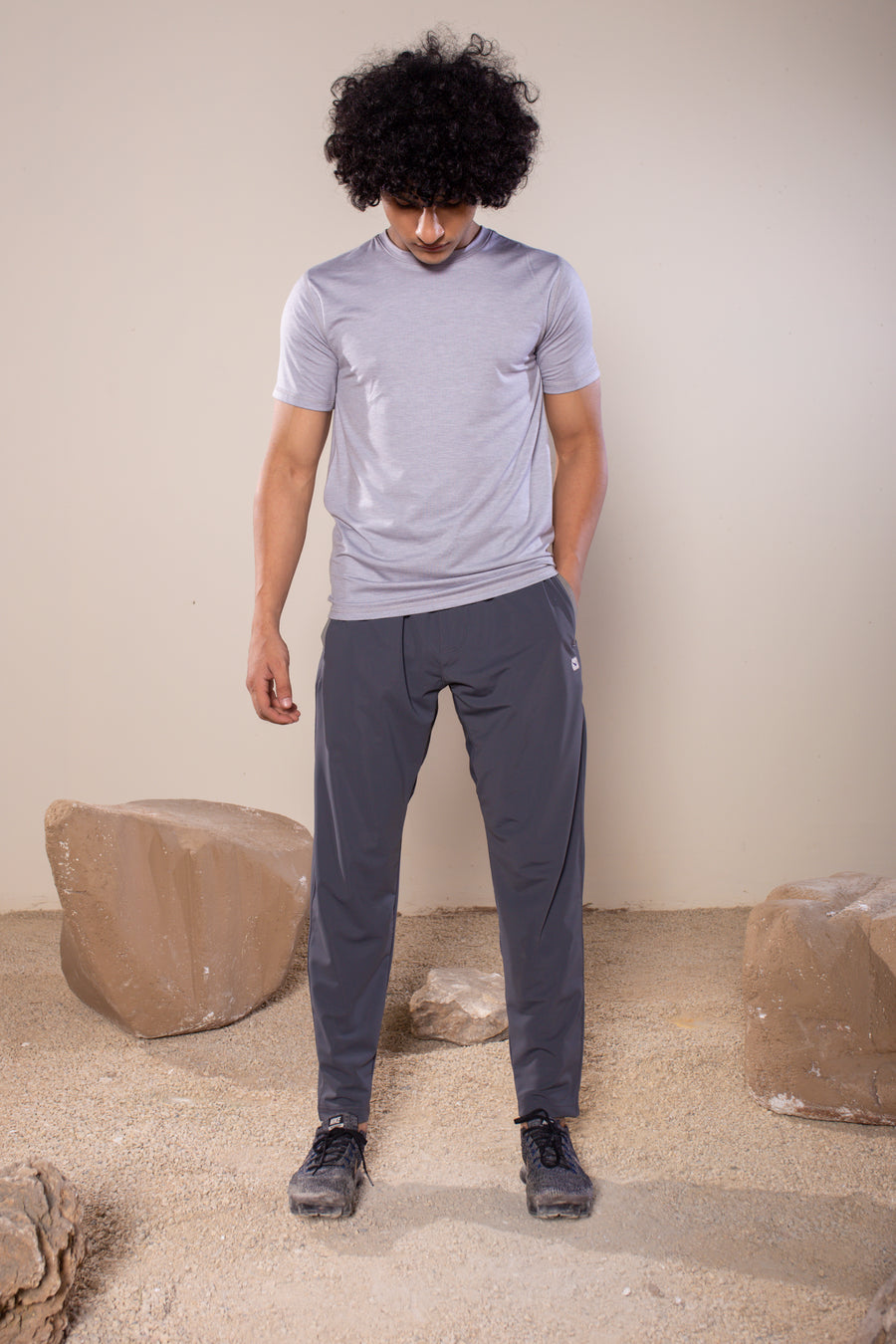 Men's Wanderlust Pant Dark Gray | VOLO Apparel | These pants are designed to give you wanderlust, an ultralight super durable athletic pant with a five pocket design, a 3 point gusset for all your movements and a high ankle tapered bottom. The revolutional Italian nylon is patented with UPF 50 protection and extreme breathability. The one pant to go everywhere and do everything!