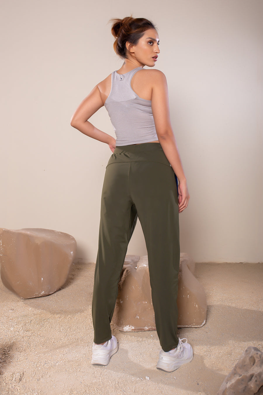 Women's Wanderlust Pant Olive | VOLO Apparel | These pants are designed to give you wanderlust, an ultralight super durable athletic pant with a five pocket design, a 3 point gusset for all your movements and a high ankle tapered bottom. The revolutional Italian nylon is patented with UPF 50 protection and extreme breathability. The one pant to go everywhere and do everything!