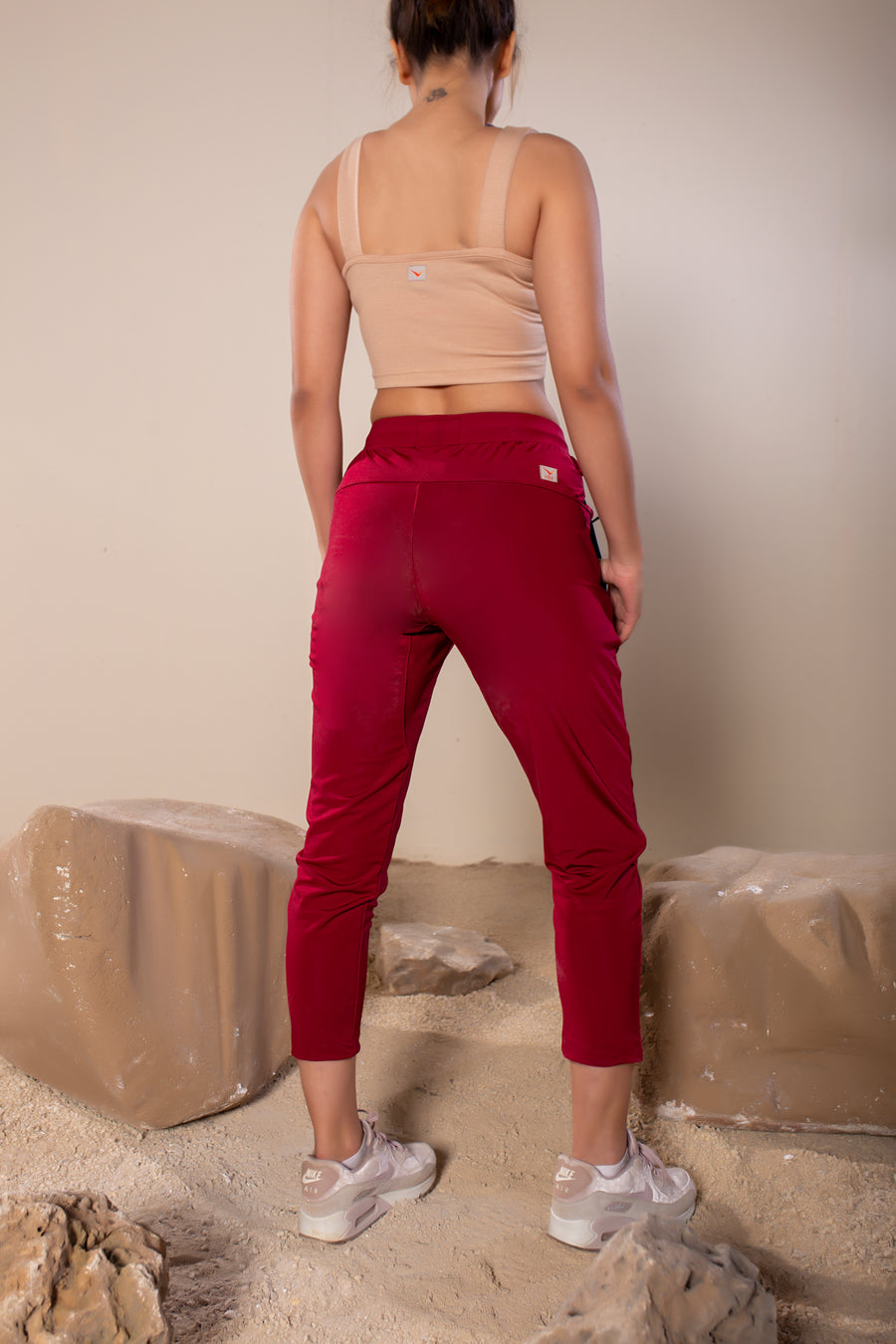 Women's Wanderlust Pant Maroon | VOLO Apparel | These pants are designed to give you wanderlust, an ultralight super durable athletic pant with a five pocket design, a 3 point gusset for all your movements and a high ankle tapered bottom. The revolutional Italian nylon is patented with UPF 50 protection and extreme breathability. The one pant to go everywhere and do everything!