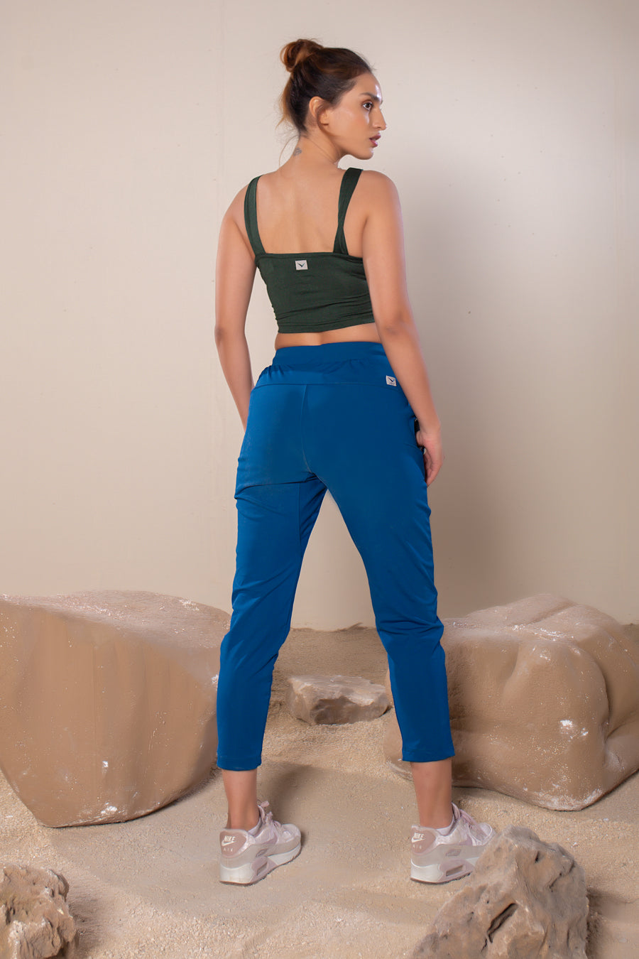Women's Vera Crop in Dark Green | VOLO Apparel | The perfect athletic crop top made with a four way stretch bamboo fiber blend. Double lined and naturally odor resistant and antimicrobial. The Vera bamboo crop is reinforced stitched, the bamboo fiber comes with its own climate control properties, making the tops more breathable in the heat and more insulating in the cold.