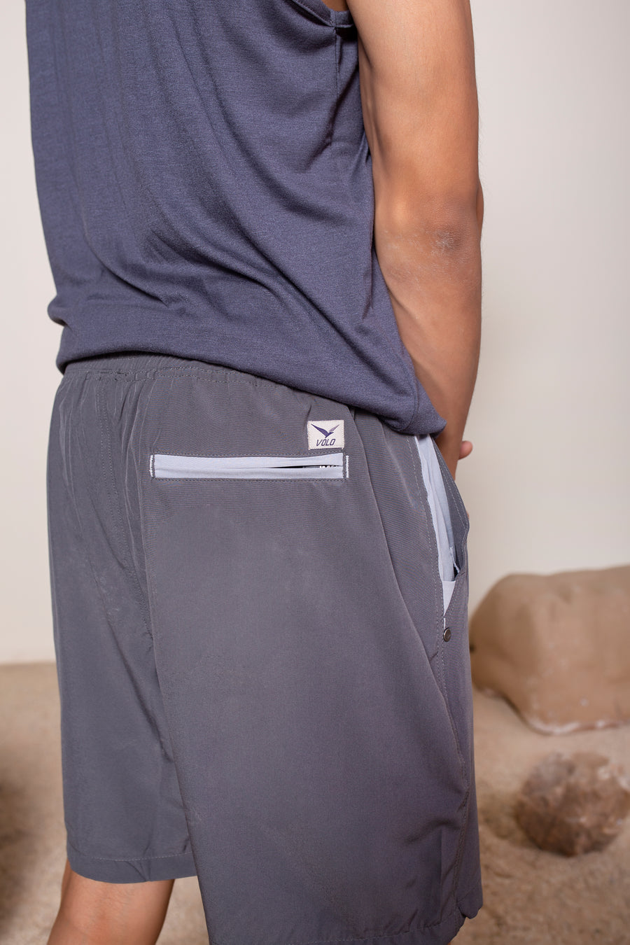 Men's Earth Shorts in Dark Gray | VOLO Apparel | Designed to fit into your active life without looking like athletic wear. Earth Shorts 2.0 come with a super strong ultralight microstretch fabric and a five pocket design. Two zipper pockets, a security pocket and super quick drying material. The shorts feature an internal drawstring and are reinforced stitched and ultra durable for all your adventures in or out of the city.