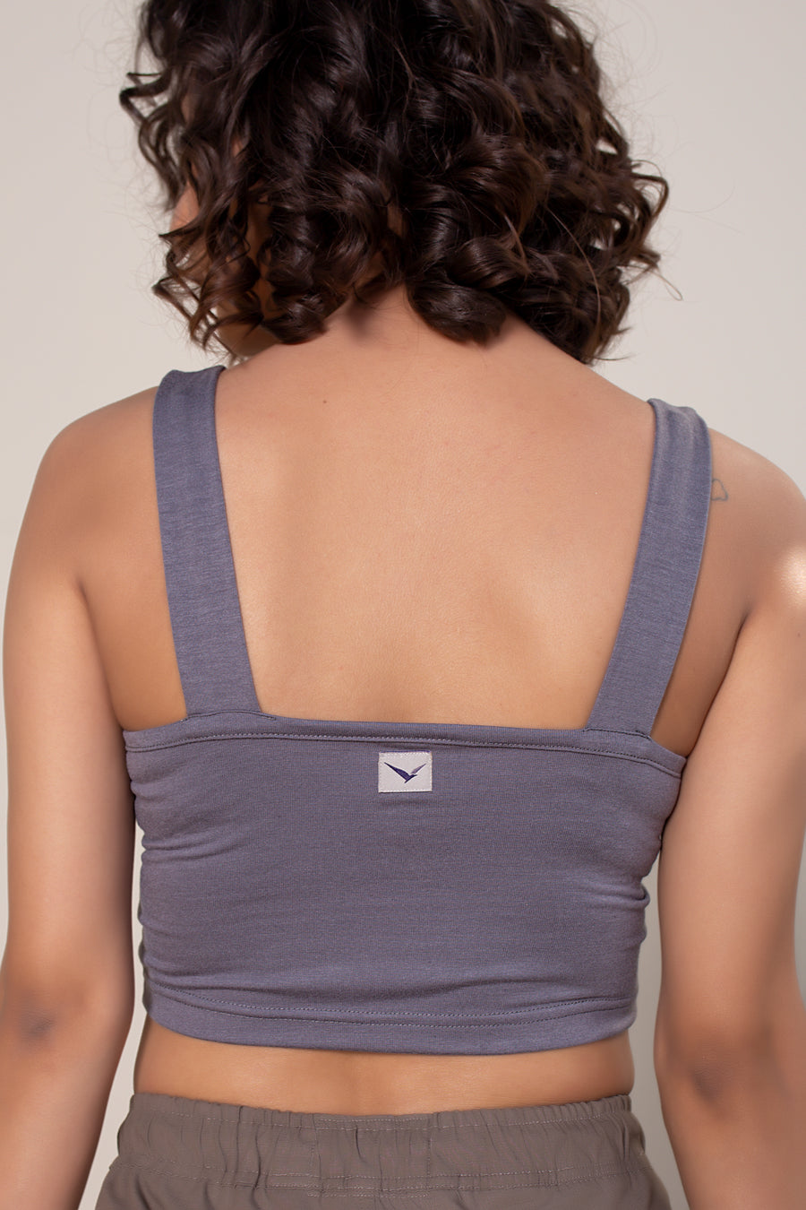 Women's Vera Crop in Charcoal | VOLO Apparel | The perfect athletic crop top made with a four way stretch bamboo fiber blend. Double lined and naturally odor resistant and antimicrobial. The Vera bamboo crop is reinforced stitched, the bamboo fiber comes with its own climate control properties, making the tops more breathable in the heat and more insulating in the cold.