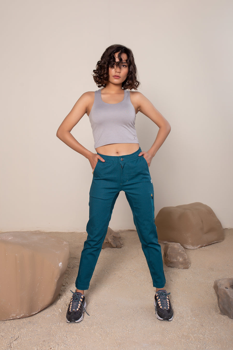 Women's Sequoia Canvas Pant in Teal | VOLO Apparel | Made with an ultra durable stretch cotton canvas, the Sequoia Canvas Pant is our ultimate six pocket lifestyle pant. Featuring a modern slim fit and a 33 inch inseam, a 3 point gusset, snap button security pockets, 2 zipper pockets and the comfort of durable canvas, these are your go to adventure pants that can handle anything you throw at them.