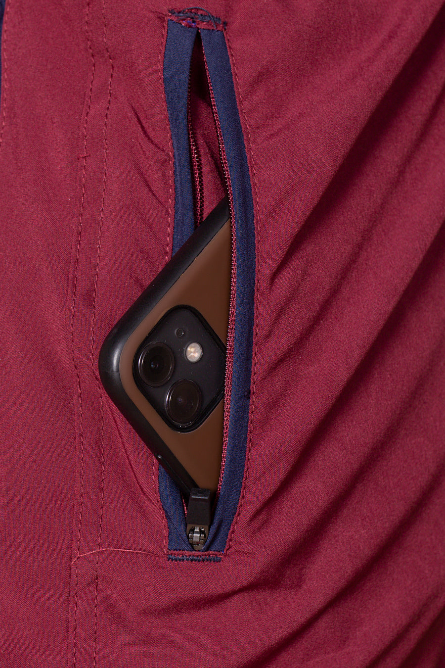 Men's Flight Shorts in Maroon | VOLO Apparel | Designed so you can feel fly and completely secure, the Flight Shorts 2.0 are made with an ultralight micro stretch fabric that is quick drying and comes with a three zipper pocket design. The smart pocket tech makes it so your stuff won’t bounce when you do. Reinforced stitching so it can handle everything you will throw at it. The one short for your every adventure.