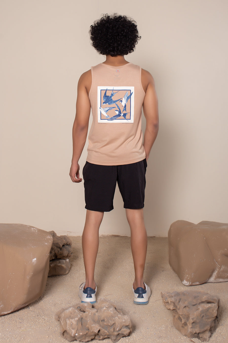 Men's Solo Bamboo Tank Beige Barn Swallow | VOLO Apparel | Made with a blend of bamboo fibers and a four way stretch spandex, Solo Bamboo Tank features an ultra soft tank that is full of features. The bamboo fibers are naturally odor resistant and antimicrobial, the fit is a tailored fit, each tank features a unique print.