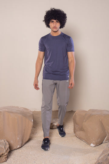 Men's Wanderlust Pant Stone Gray | VOLO Apparel | These pants are designed to give you wanderlust, an ultralight super durable athletic pant with a five pocket design, a 3 point gusset for all your movements and a high ankle tapered bottom. The revolutional Italian nylon is patented with UPF 50 protection and extreme breathability. The one pant to go everywhere and do everything!