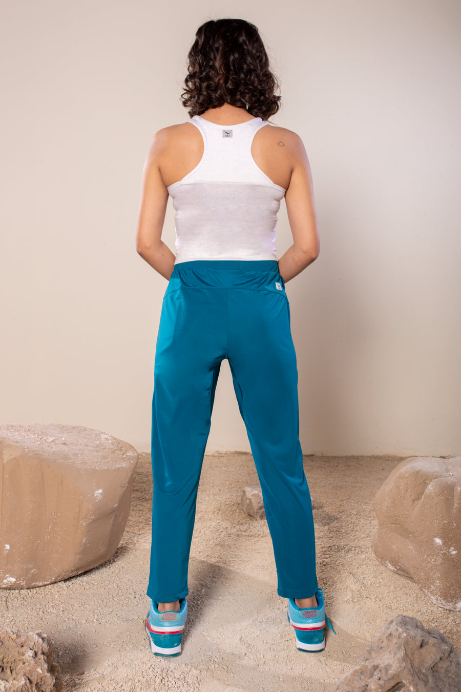 Women's Wanderlust Pant Tropical Teal | VOLO Apparel | These pants are designed to give you wanderlust, an ultralight super durable athletic pant with a five pocket design, a 3 point gusset for all your movements and a high ankle tapered bottom. The revolutional Italian nylon is patented with UPF 50 protection and extreme breathability. The one pant to go everywhere and do everything!