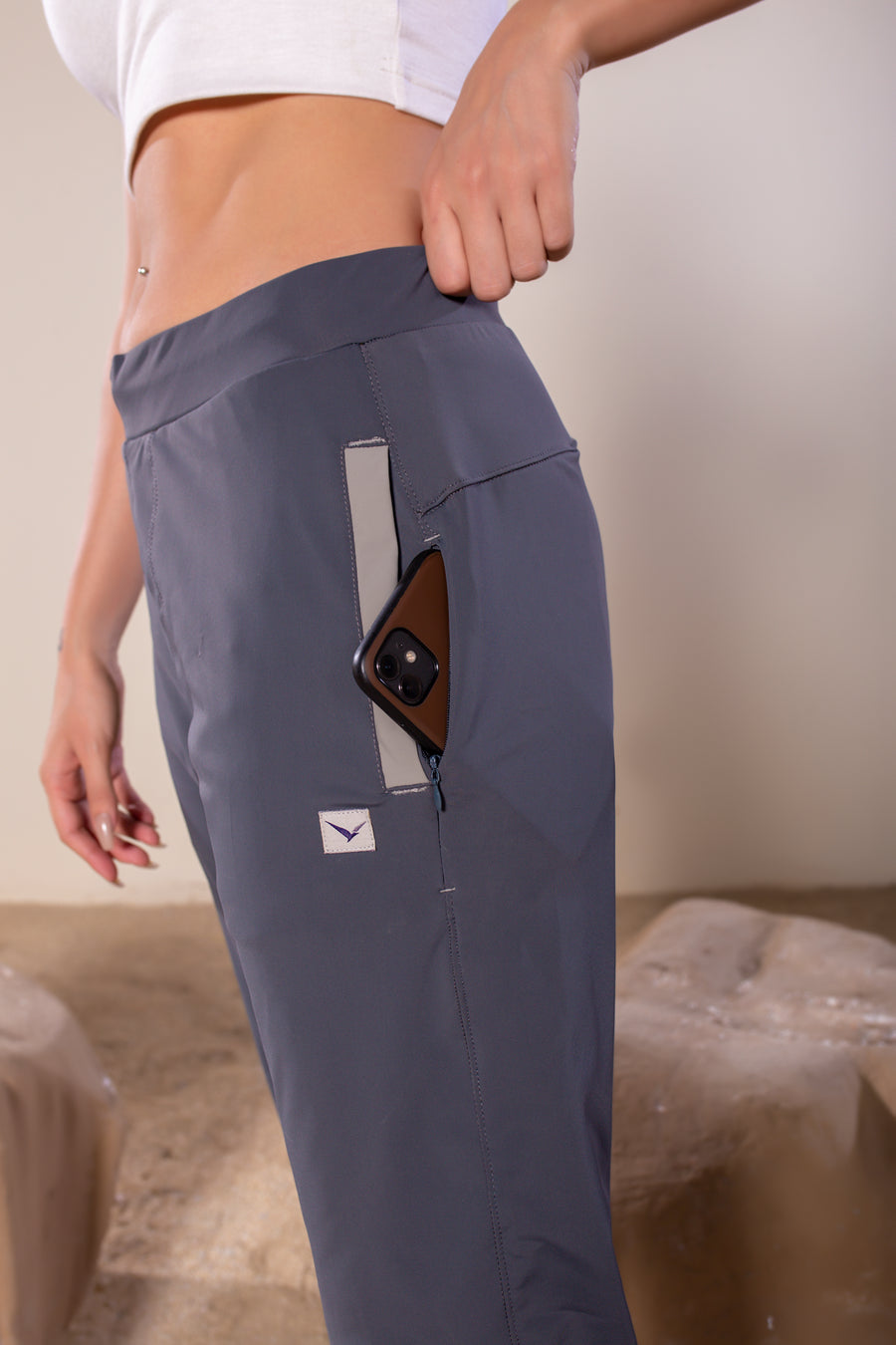Women's Wanderlust Pant Dark Gray | VOLO Apparel | These pants are designed to give you wanderlust, an ultralight super durable athletic pant with a five pocket design, a 3 point gusset for all your movements and a high ankle tapered bottom. The revolutional Italian nylon is patented with UPF 50 protection and extreme breathability. The one pant to go everywhere and do everything!
